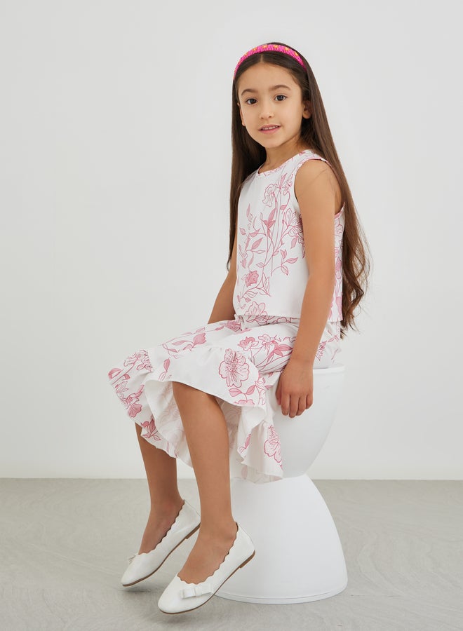 ستايلي طقم بلوزة بناتي بطبعات زهور وكشكشة مع بنطلون واسع بحافة غير متماثلة - Image 1