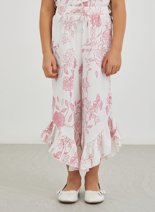 ستايلي طقم بلوزة بناتي بطبعات زهور وكشكشة مع بنطلون واسع بحافة غير متماثلة - Image 5