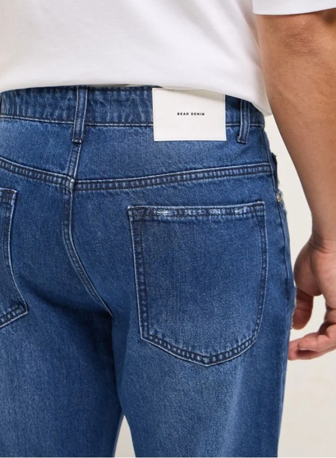 The Bear House  Men's Blue with Light Fade High Distressed Mid-Rise Relaxed Fit Jeans Classic Comfort With Modern Style, Perfect For Everyday Casual Looks And Effortless Streetwear Vibes for Men | Best Price UAE