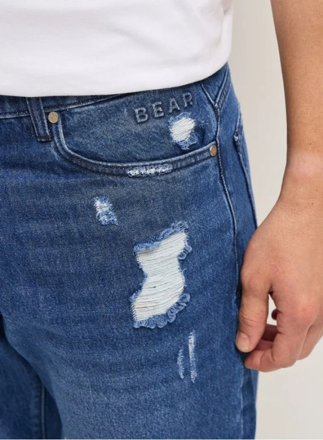 The Bear House  Men's Blue with Light Fade High Distressed Mid-Rise Relaxed Fit Jeans Classic Comfort With Modern Style, Perfect For Everyday Casual Looks And Effortless Streetwear Vibes for Men | Best Price UAE