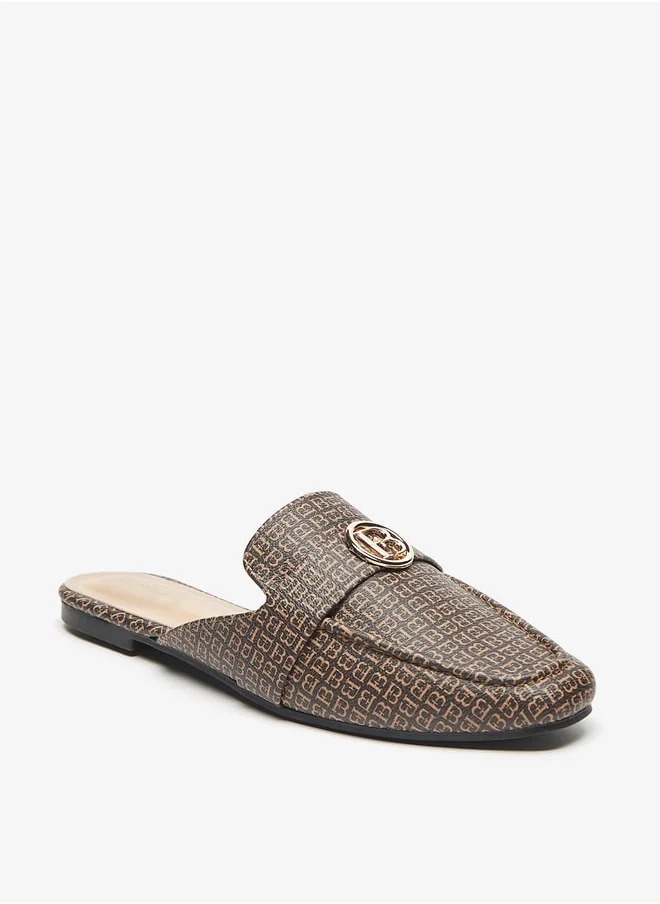 فلورا بيلا من شو إكسبرس All-Over Monogram Print Slip-On Mules with Metal Accent