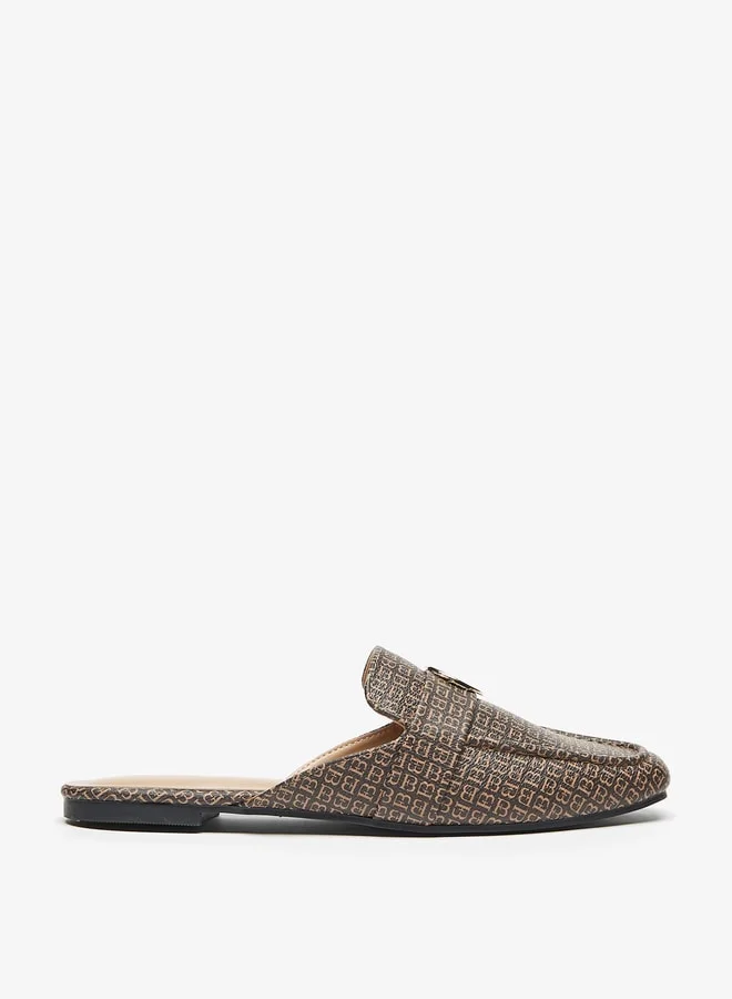 فلورا بيلا من شو إكسبرس All-Over Monogram Print Slip-On Mules with Metal Accent