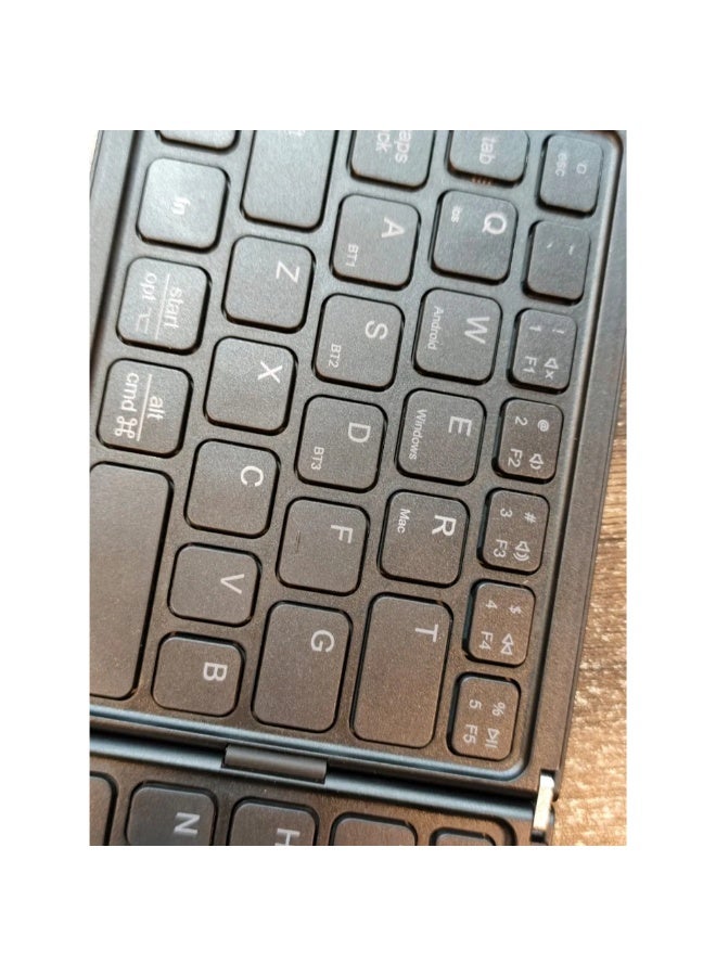 أكاليكس لوحة مفاتيح بلوتوث قابلة للطي، محمولة للغاية، رفيعة، متعددة الأجهزة، لاسلكية صغيرة، 66 مفتاحًا، بحجم الجيب، قابلة لإعادة الشحن، ثلاثية الأوضاع، لأجهزة الكمبيوتر المحمولة واللوحية التي تعمل بنظامي التشغيل ويندوز وآي أو إس وأندرويد (أسود) - Image 2