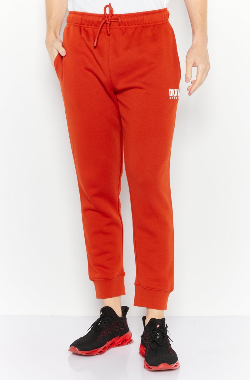 DKNY Sport Men Sportswear Fit Training Pant, Rust - Image 1