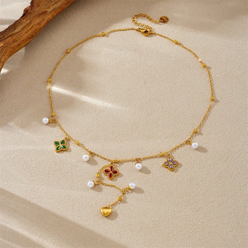 سلسلة أستانليس أستيل ذهبي مع دلايات شكل وردة مرصعة بفصوص الزيركون - Image 3