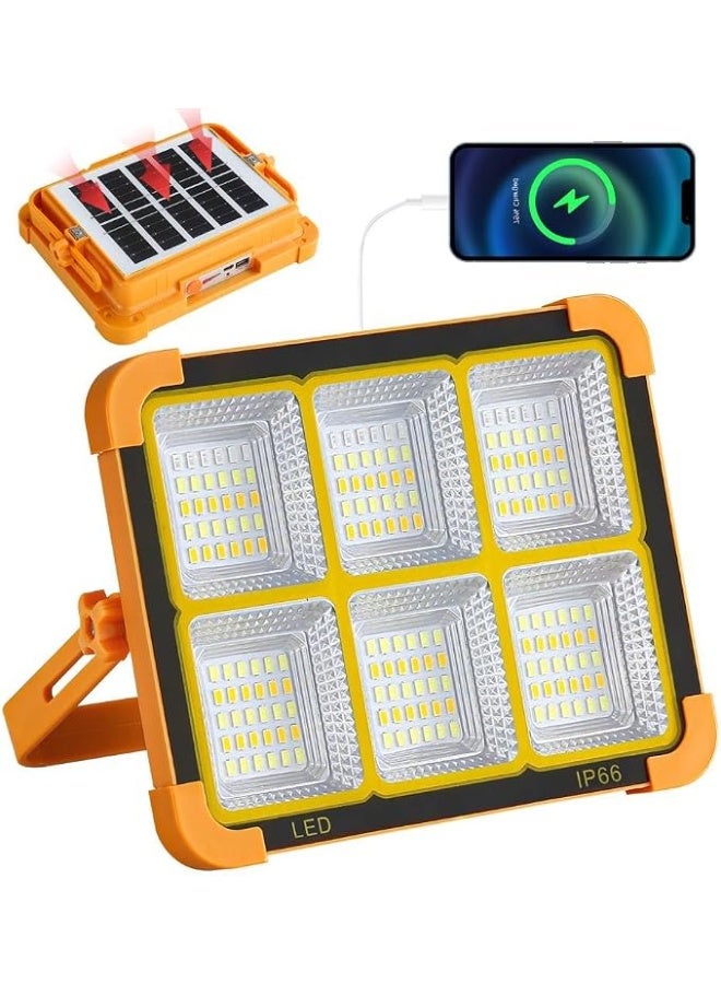 كشاف إضاءة LED بالطاقة الشمسية مع بنك طاقة – مقاوم للماء IP68 قابل لإعادة الشحن، مصباح عمل للتخييم مع شحن USB للهاتف، لوح شمسي قابل للطي للاستخدام الخارجي والطوارئ والمنزل (برتقالي/أسود) - Image 1