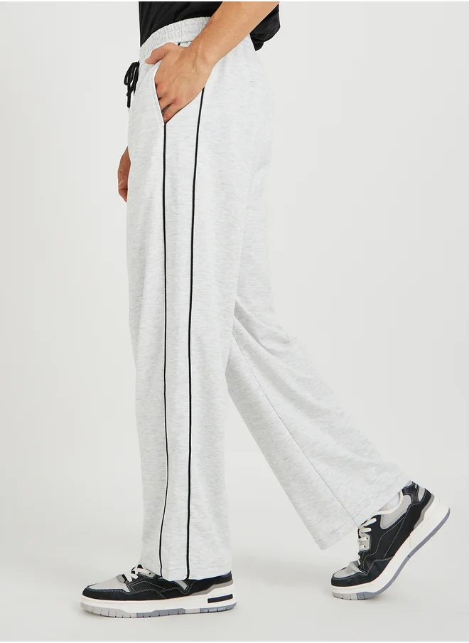 ستايلي Styli Solid Straight Fit Open Hem Joggers with Piping Detail
