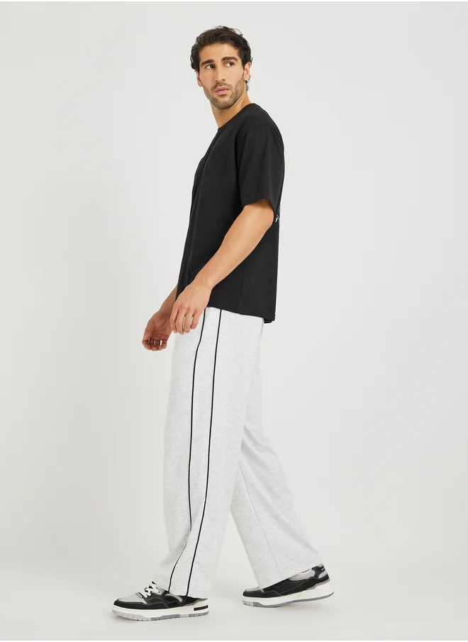 ستايلي Styli Solid Straight Fit Open Hem Joggers with Piping Detail