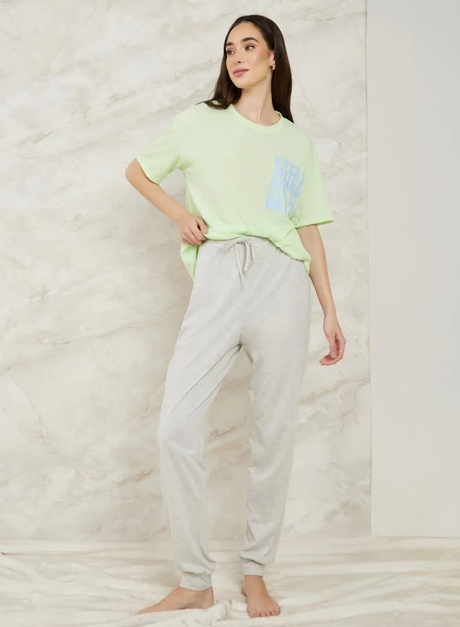 Styli Drop Shoulder Slogan Print T-Shirt & Cuff Pyjama Set