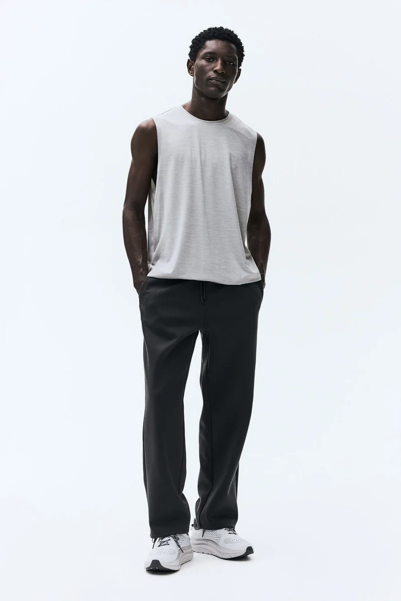 اتش اند ام بلوزة فيست رياضية بقصة عادية من نسيج دراي موف