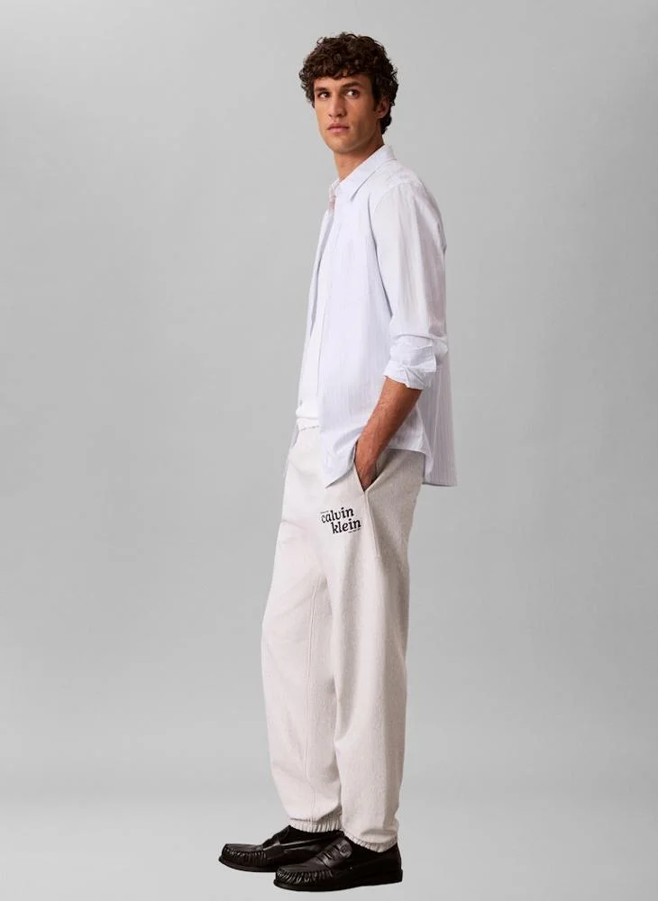 Calvin Klein Jeans Snowy Heather Relaxed Embroidered Logo Joggers for Men | Best Price UAE