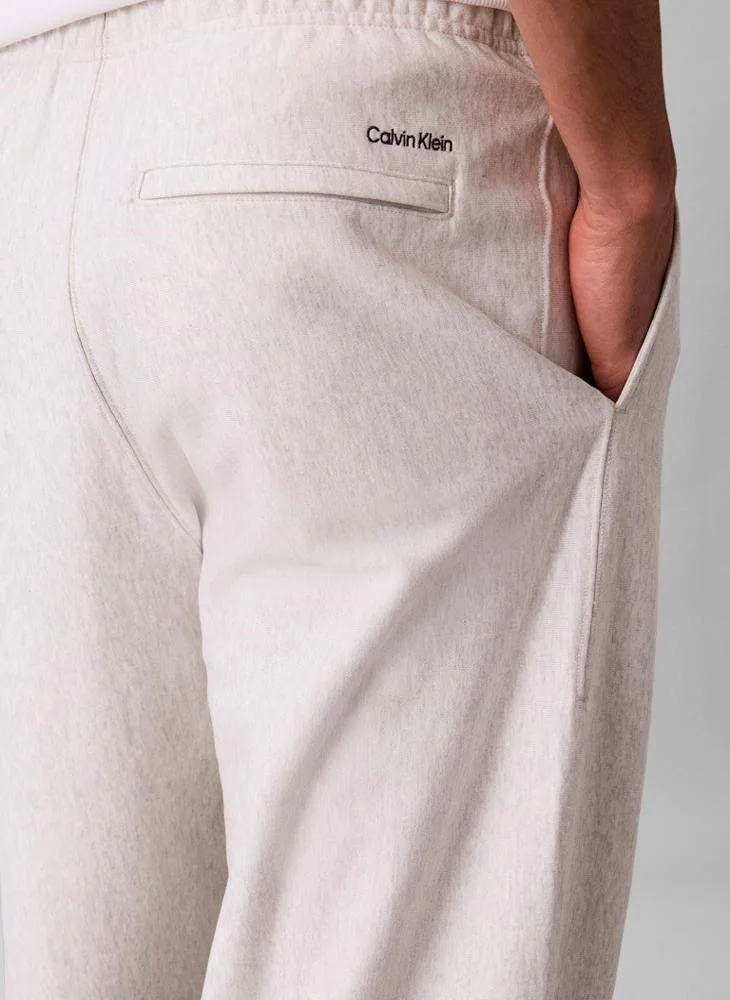 Calvin Klein Jeans Snowy Heather Relaxed Embroidered Logo Joggers for Men | Best Price UAE