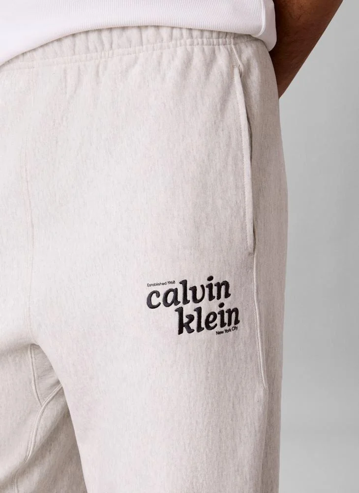 Calvin Klein Jeans Snowy Heather Relaxed Embroidered Logo Joggers for Men | Best Price UAE