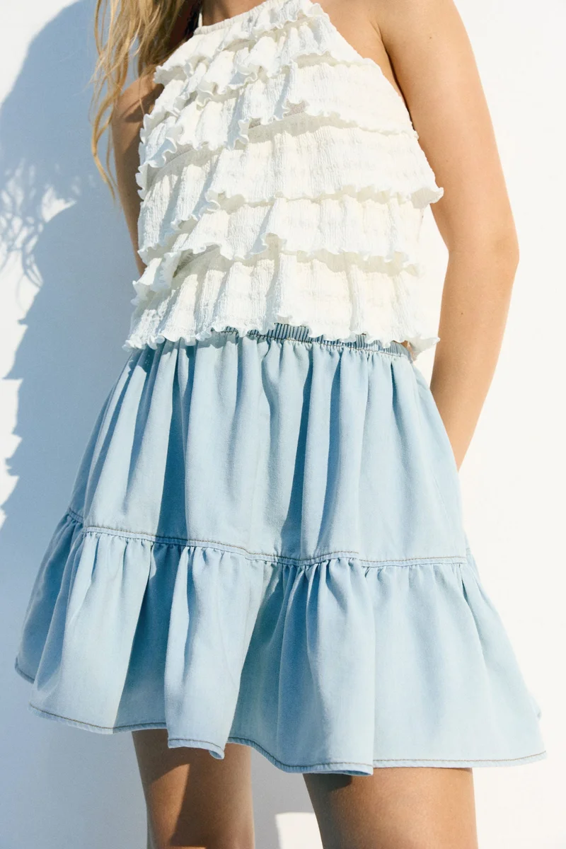 اتش اند ام تنورة ميني مزينة بكشكشة