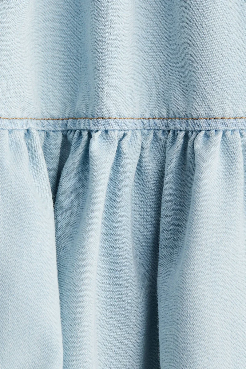 اتش اند ام تنورة ميني مزينة بكشكشة