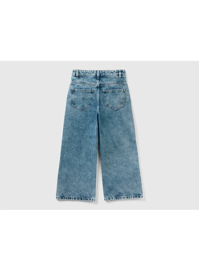 يونايتد كولورز أوف بينتيون جينز بخصر عالٍ بقصة واسعة