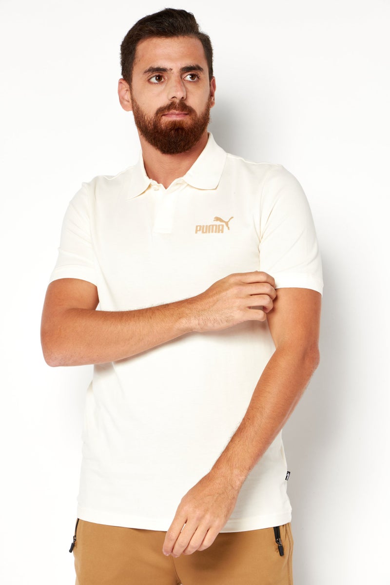 PUMA Men Sportswear Fit Short Sleeve Training Polo Shirt, Cream - Image 1