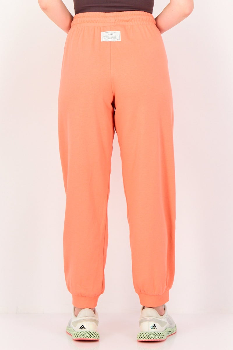 Nike سروال رياضي فضفاض للنساء، برتقالي - Image 3