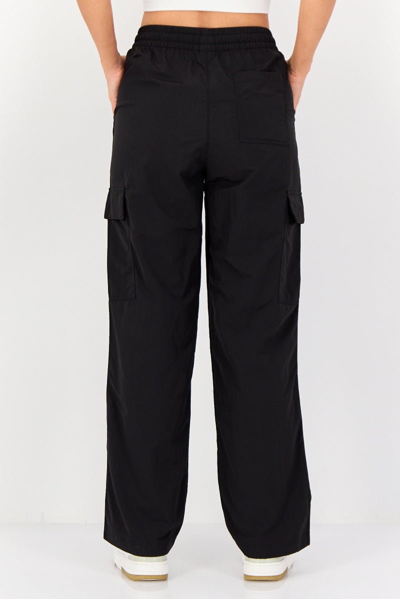 PUMA Women Sportswear Fit Outdoor Track Pants, Black - Image 4