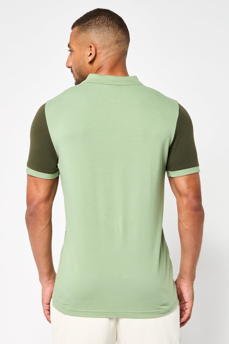 PUMA قميص بولو خارجي للرجال بقصة ضيقة بأكمام قصيرة، أخضر - Image 4
