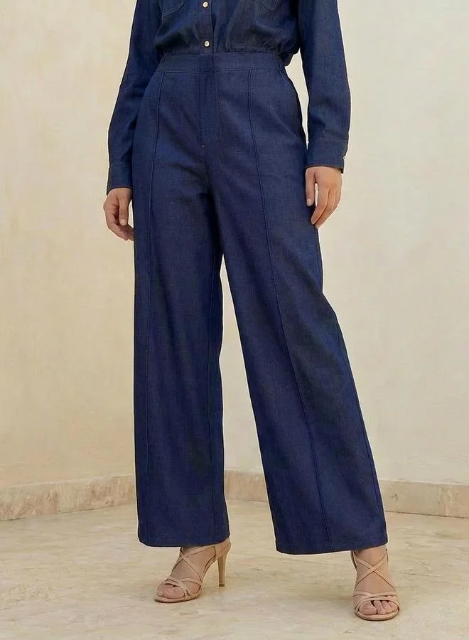 Baggy Fit Mid Rise Pleated Denim Trousers
