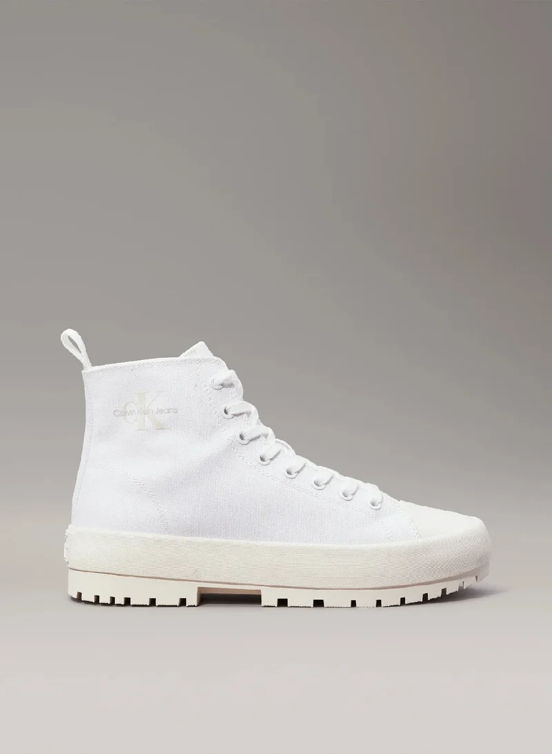 كالفن كلاين جينز حذاء رياضي برقبة عالية من قماش الكانفاس