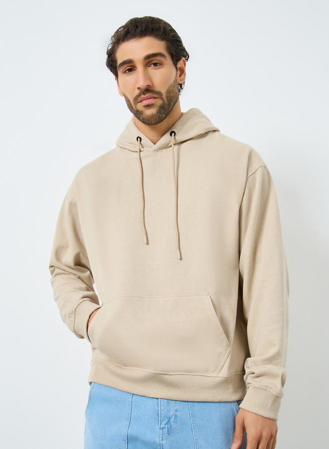 Styli Men Beige Relaxed Fit Slogan Hoodie - Image 1