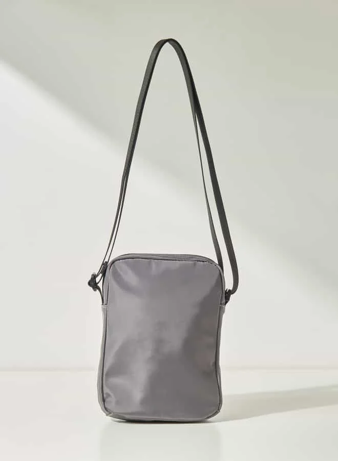 لي كوبر Men Solid Sling Bag with Zip Closure and Adjustable Strap