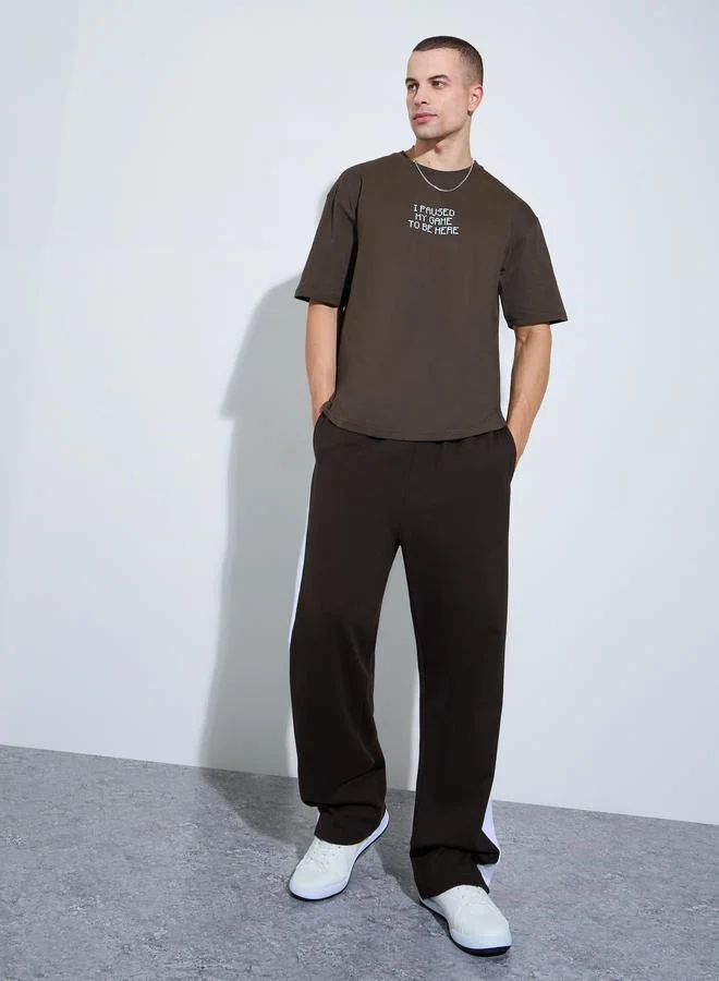 Styli Men Brown Graphic Print Oversized T-Shirt