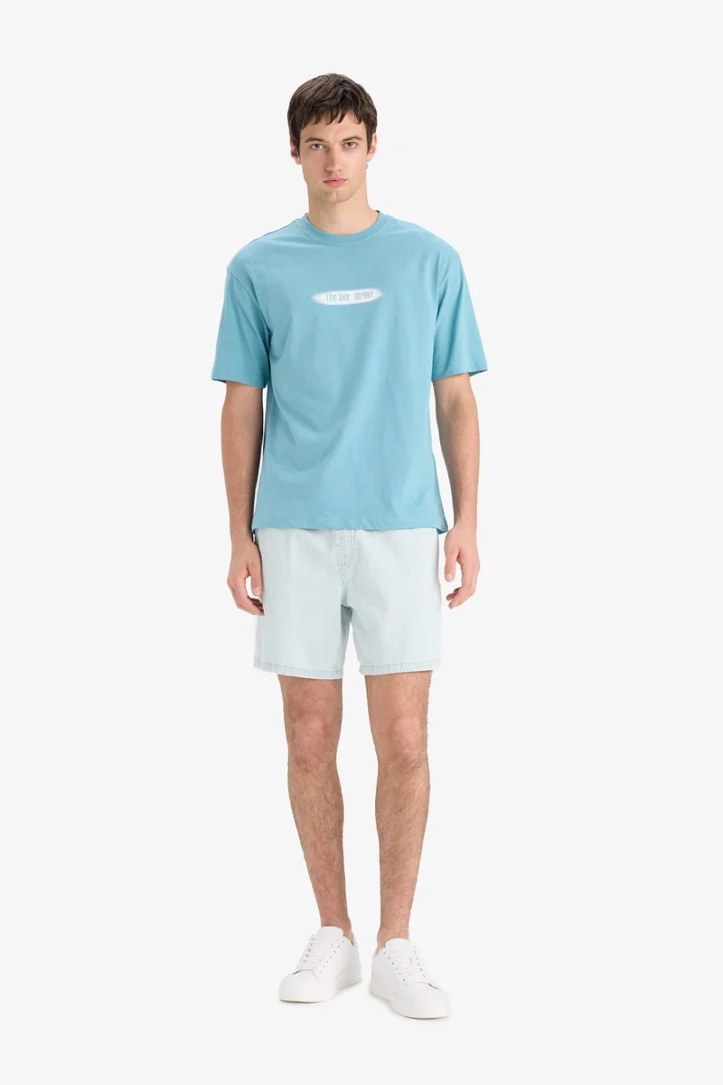 ديفاكتو Boxy Fit Crew Neck Printed Short Sleeve T-Shirt