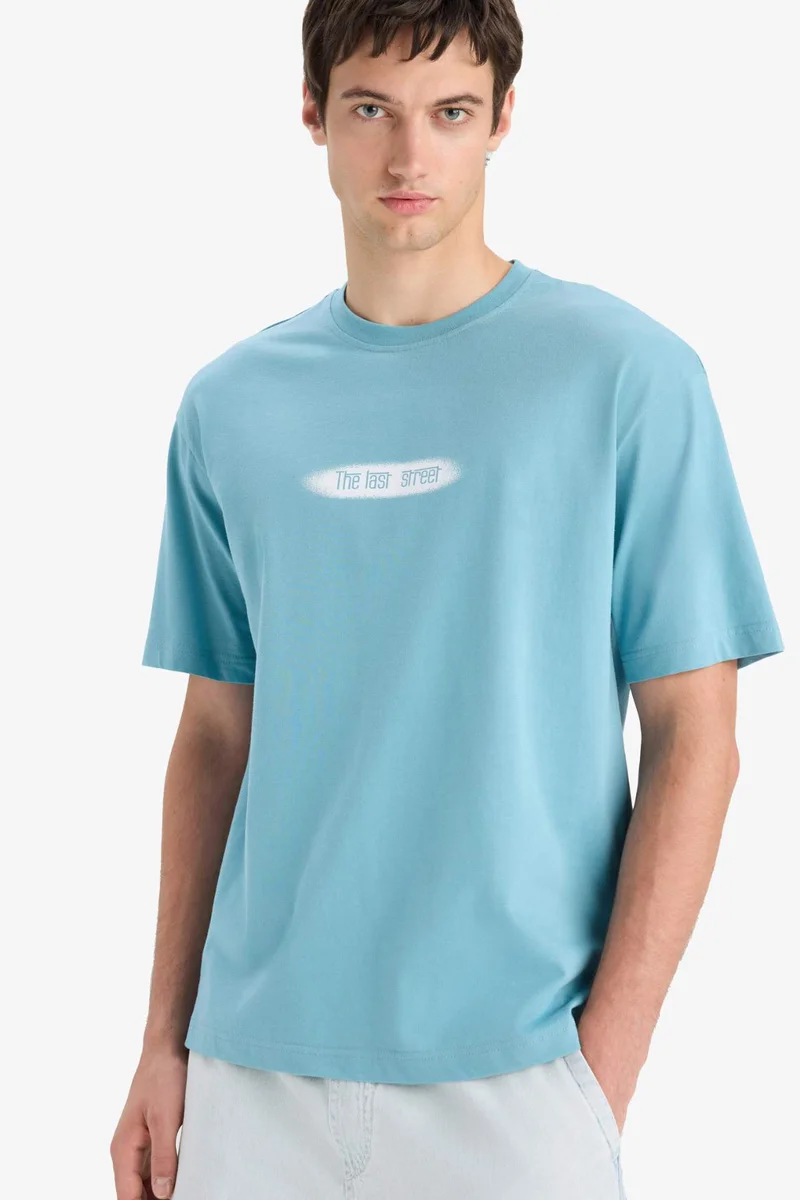ديفاكتو Boxy Fit Crew Neck Printed Short Sleeve T-Shirt