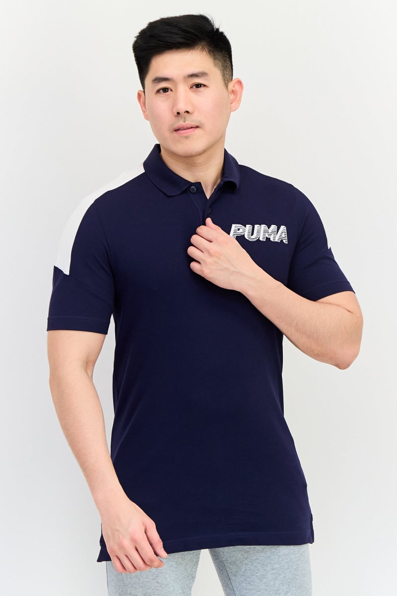 PUMA Men Sportswear Fit Short Sleeves Outdoor Polo Shirt, Navy Blue - Image 1