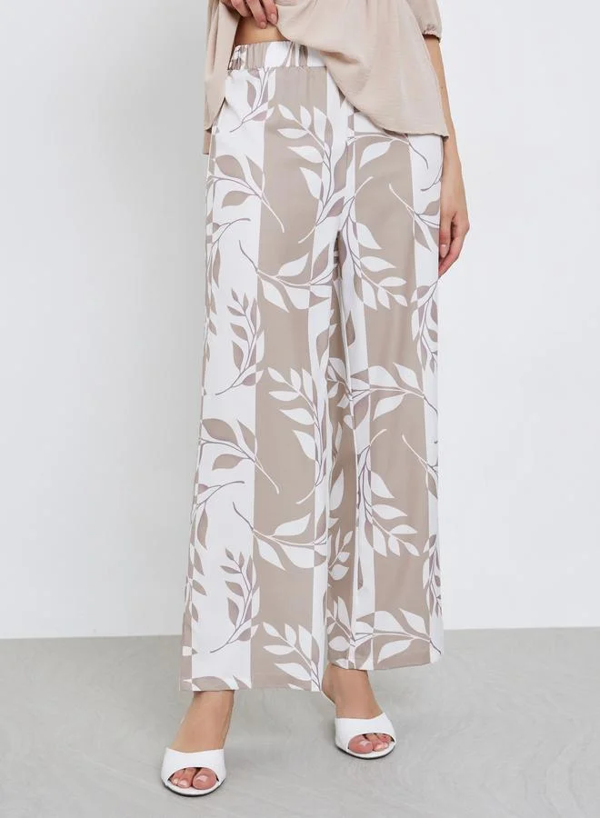 تايك تو طقم بلوزة بأكمام نصفية وكشكش وسروال بطبعة أوراق شجر