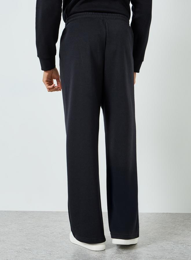 ستايلي جوغر رجالي واسع بطبعة نصية - Image 4