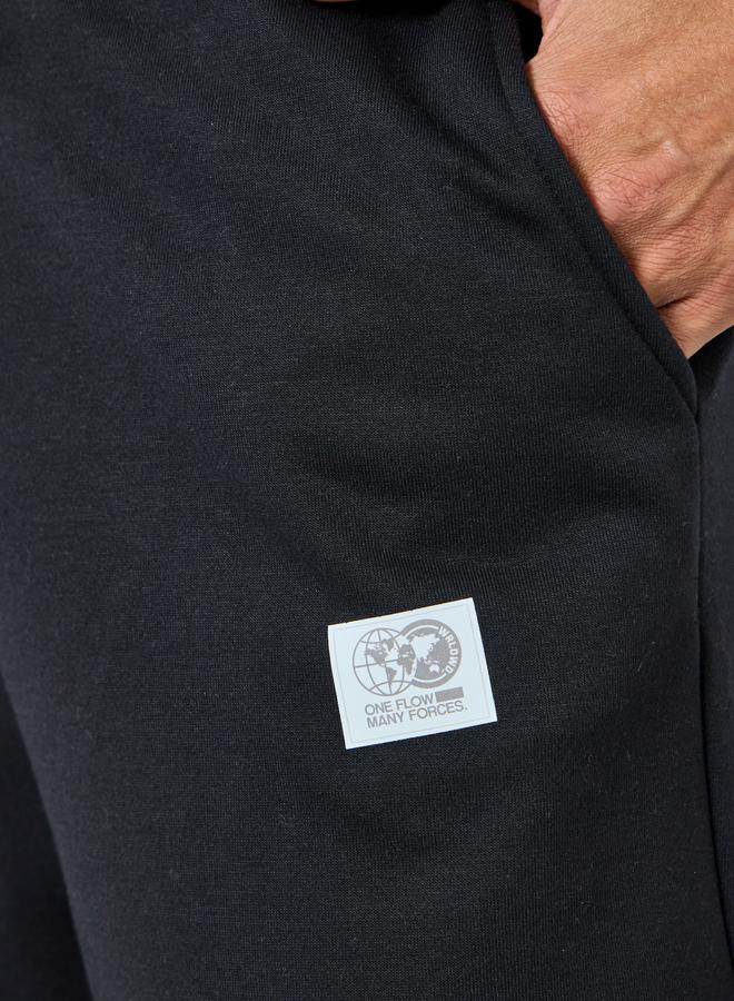 ستايلي جوغر رجالي واسع بطبعة نصية - Image 3