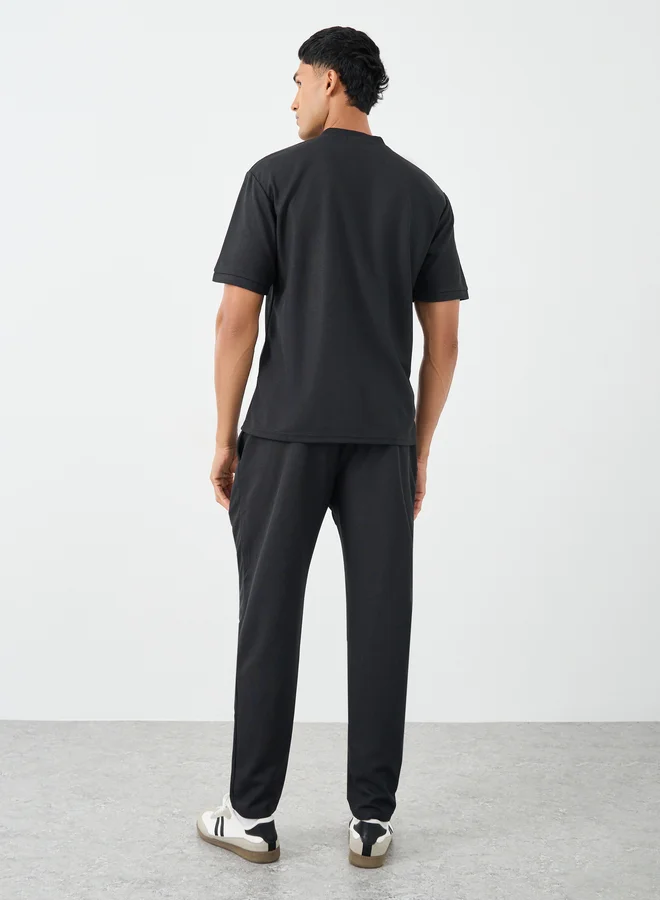 ستايلي Styli Men Solid Regular Fit T-Shirt and Joggers Co-ords