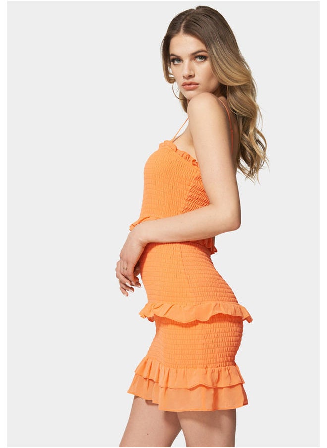 bebe - SMOCKED RUFFLE MINI DRESS - Image 1