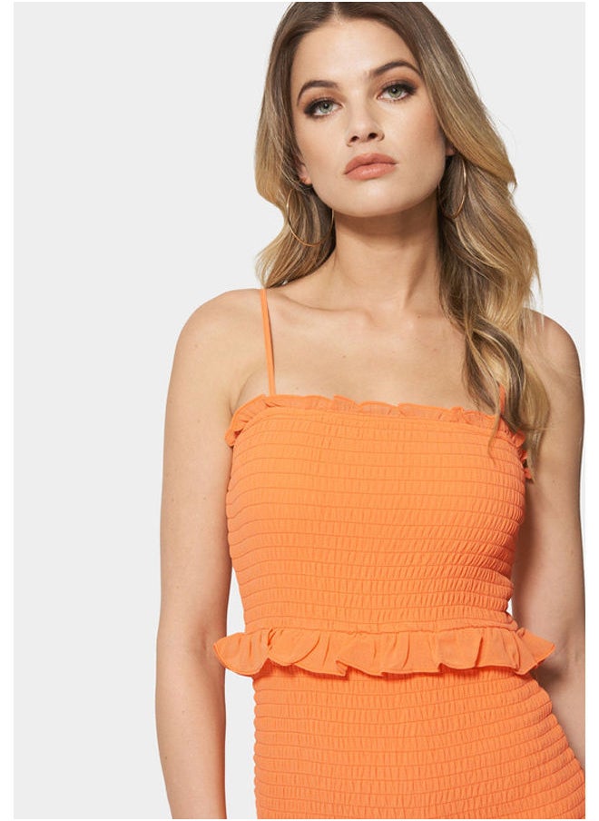bebe - SMOCKED RUFFLE MINI DRESS - Image 1