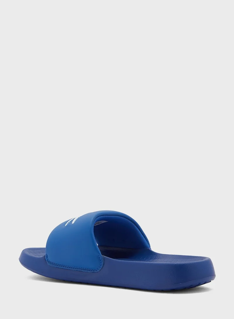 LACOSTE Serve Logo Slide
