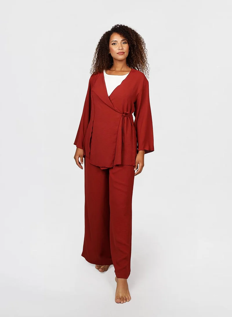 جيمي لي بوند Modest 2 pc Set of wrap-style long-sleeve top with a side tie detail, paired with wide-leg pants