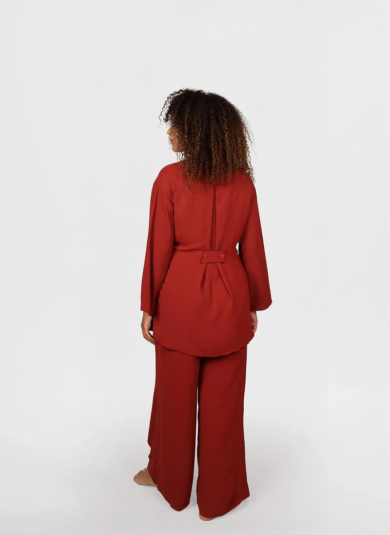 Jimmy Le Bond Modest 2 pc Set of wrap-style long-sleeve top with a side tie detail, paired with wide-leg pants