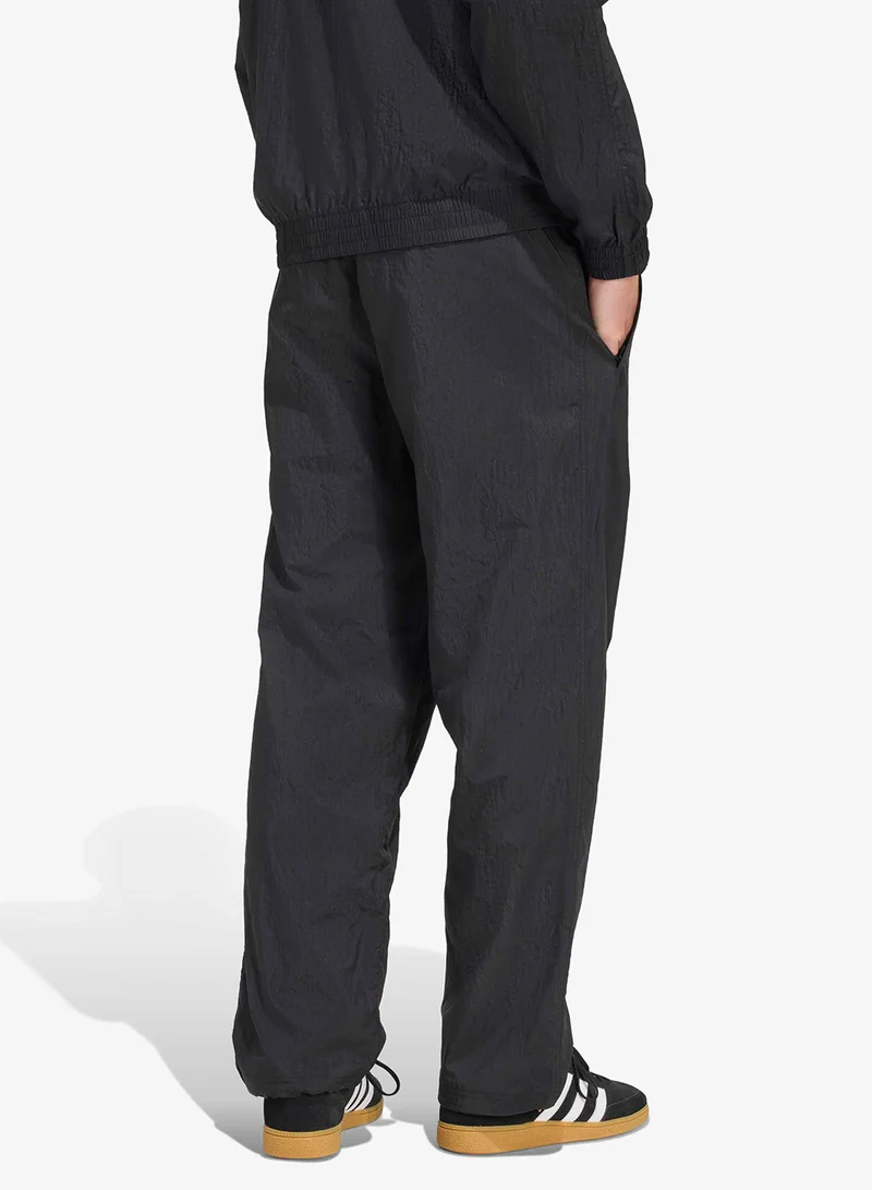 اديداس اوريجينالز بنطلون رياضي فضفاض للشباب