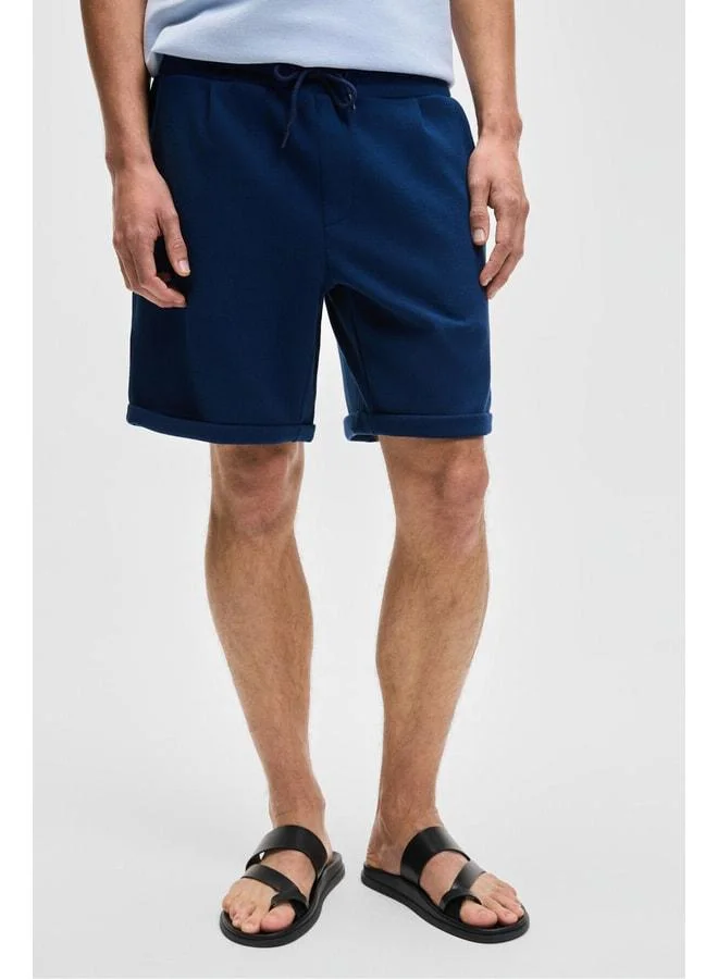 Grimelange YOURI Men's Elastic Waist Single Back Pocket Relaxed Fit Navy Shorts.