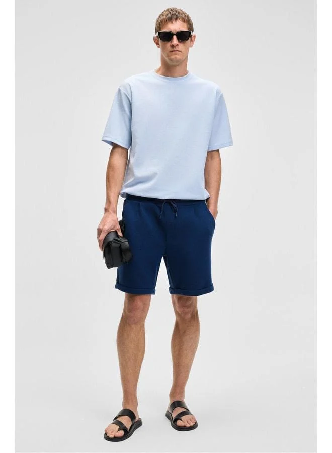 Grimelange YOURI Men's Elastic Waist Single Back Pocket Relaxed Fit Navy Shorts.