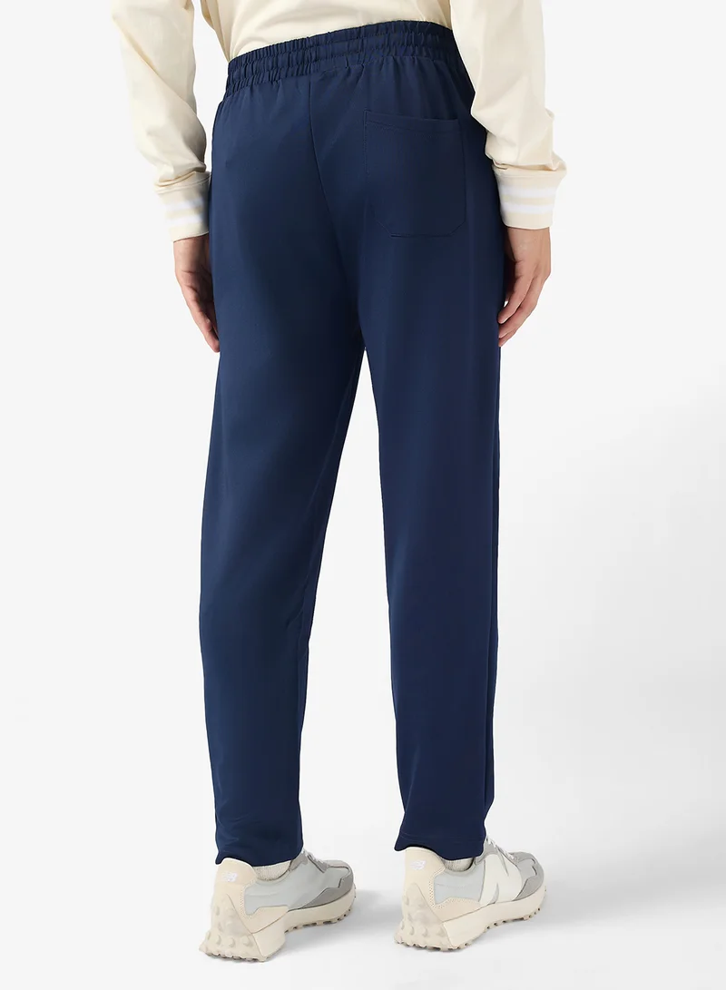سفنتي فايف بيسيكس Relaxed Fit Emblem Joggers