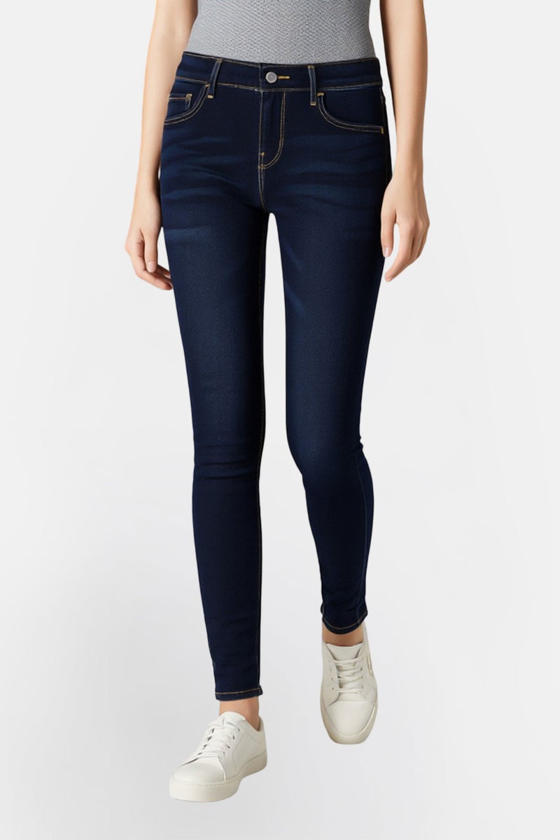 Levi's جينز ضيق للنساء، مغسول وقابل للتمدد، أزرق داكن - Image 1