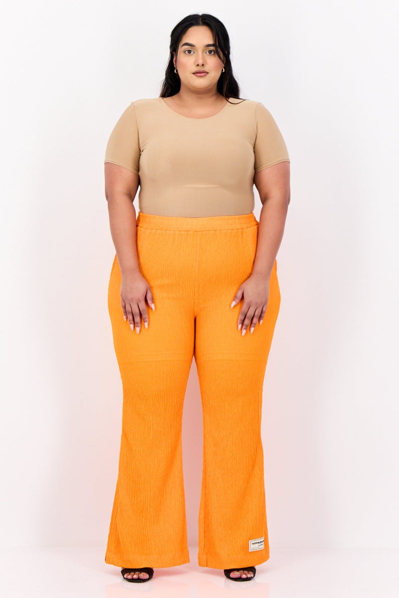 The Giving Movement Women Regular Fit Textured Flare Pants, Orange - Image 1
