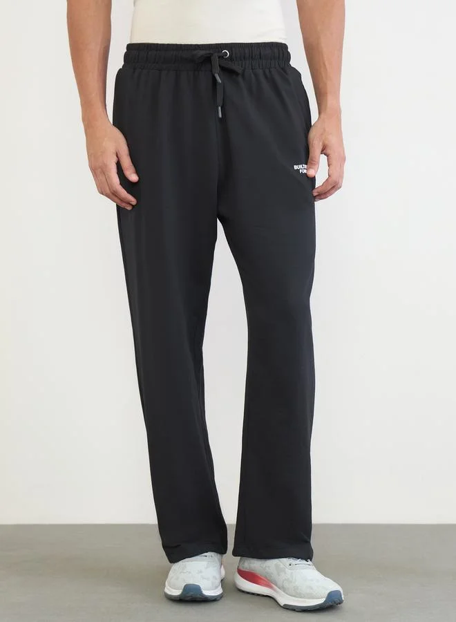 Styli Men Black Slogan Oversized Joggers
