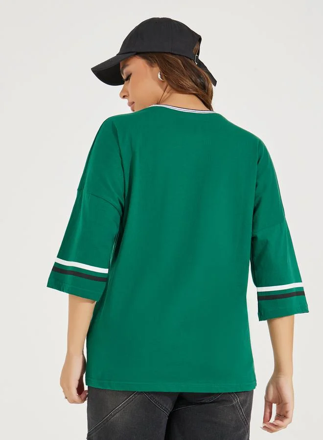 Styli Oversized Montana Slogan T-Shirt with Exaggerated Sleeves