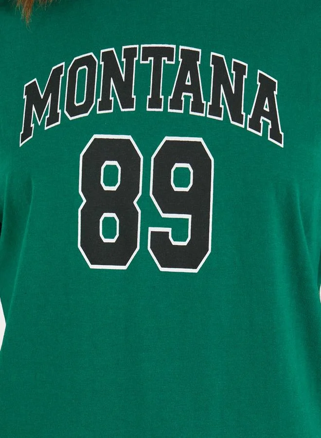 Styli Oversized Montana Slogan T-Shirt with Exaggerated Sleeves